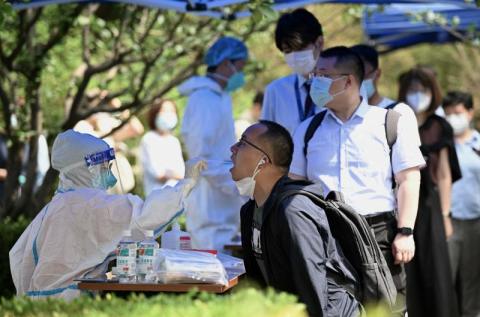 الصين تسجل 230 إصابة جديدة بـ«كوفيد-19»