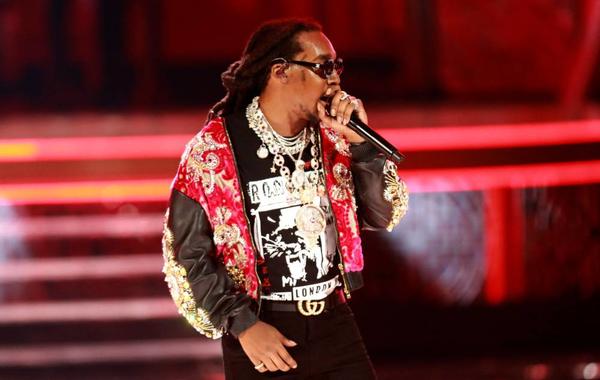 FILES) In this file photo taken on June 24, 2018, US rapper Takeoff, of Migos, performs onstage at the 2018 BET Awards at Microsoft Theater in Los Angeles, California. The rapper Takeoff, a member of the Grammy-nominated hip hop trio Migos, was fatally shot at a bowling alley in Houston, Texas, on November 1, 2022, according to entertainment outlet TMZ. He was 28 years old. Leon Bennett / GETTY IMAGES NORTH AMERICA / AFP)