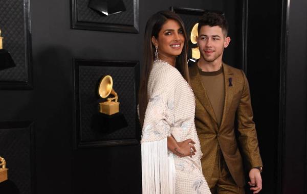 Indian actress Priyanka Chopra (L) and US singer-songwriter Nick Jonas arrive for the 62nd Annual Grammy Awards on January 26, 2020, in Los Angeles. VALERIE MACON / AFP